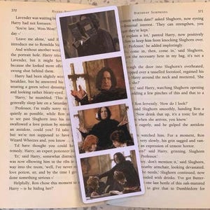 May include: A rectangular bookmark featuring three images of a character from the Harry Potter film series. The images are in a vertical arrangement, showing the character in different poses. The bookmark is set against the backdrop of an open book.