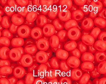 May include: A close-up image of a pile of small, opaque, light red seed beads. The beads are size 11/0 and the colour code is 66434912. The beads are available in 20g and 50g packages.