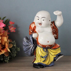 Hand-Painted Ceramic Traveling Buddha Figurine: Vintage Chinese Good Luck Decor