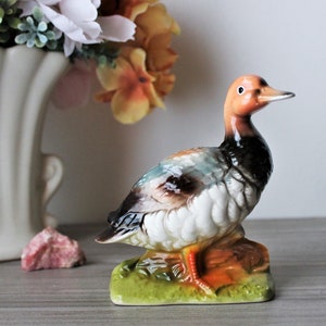 Vintage Porcelain Duck Figurine: Hand-Painted Cabin Decor