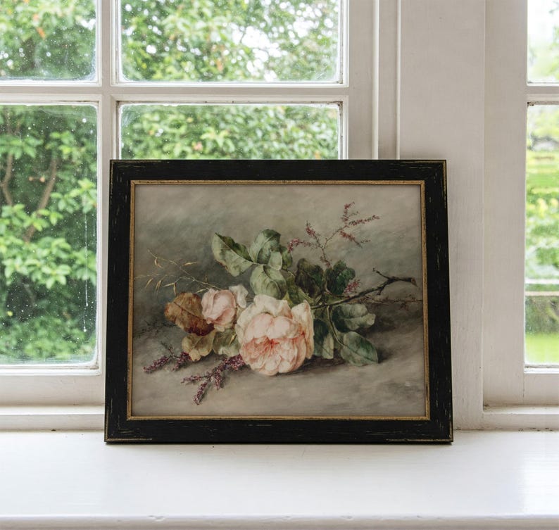 May include: A framed watercolor painting of a bouquet of pink roses with green leaves and stems. The roses are arranged on a light gray background.