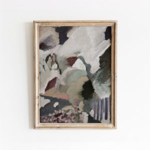 May include: Abstract painting in a wooden frame. The painting features a variety of colours, including white, grey, green, brown, and pink. The colours are blended together to create a sense of depth and movement. The painting is framed in a simple wooden frame.