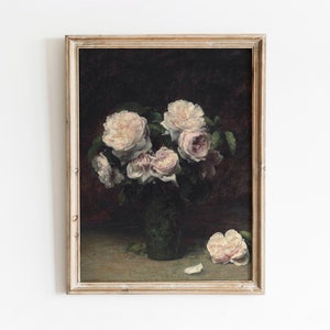 May include: A framed painting of a bouquet of white roses in a green vase. The roses are arranged in a cluster and have a soft, delicate appearance. The background is a dark, muted color, which creates a sense of depth and contrast.