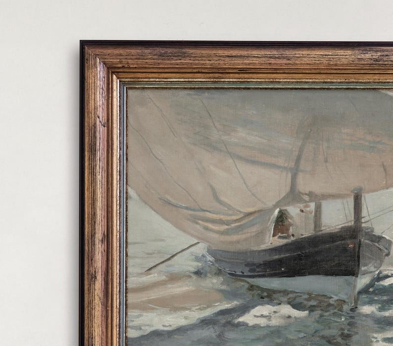May include: A framed painting of a sailboat with white sails and a dark hull, sailing on a choppy sea with whitecaps. The painting is in a brown wooden frame with a gold trim.