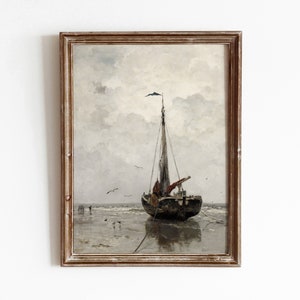May include: A framed painting of a sailboat on a beach with a cloudy sky. The sailboat is brown and has a white sail. The beach is sandy and there are some birds flying in the sky.