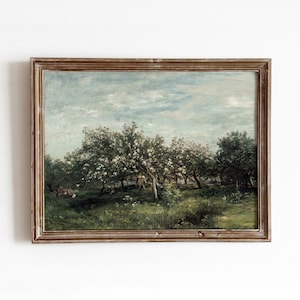 Puede incluir: Una pintura al óleo enmarcada que representa un paisaje con una arboleda de árboles en flor. Los árboles están en primer plano, con un cielo azul y nubes blancas en el fondo. La pintura está en un marco de madera marrón.