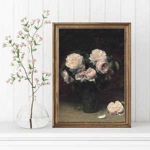 May include: A framed painting of a bouquet of pink roses in a vase. The roses are arranged in a loose, natural style, and the vase is a simple, clear glass.