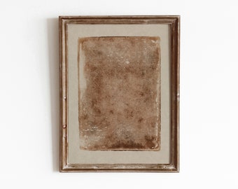 May include: A brown wooden frame with a textured, beige background. The frame is empty and ready for a picture or artwork.
