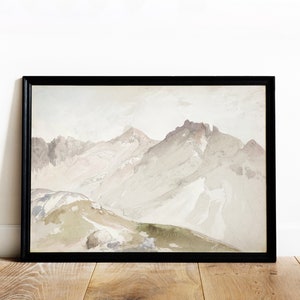 May include: A framed watercolor painting depicting a mountain range with snow-capped peaks. The painting is done in shades of gray, white, and brown, with a hint of green in the foreground.