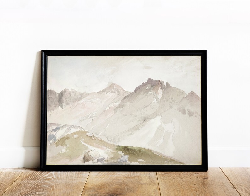 May include: A framed watercolor painting depicting a mountain range with snow-capped peaks. The painting is done in shades of gray, white, and brown, with a hint of green in the foreground.