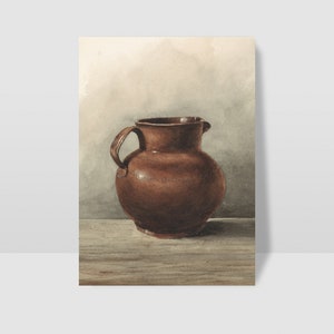 May include: A brown ceramic pitcher with a rounded body and a handle on one side. The pitcher is sitting on a wooden surface.