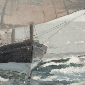 May include: A close-up of a ship's bow cutting through choppy water. The ship is painted black with a white stripe along the bottom. The sails are billowing in the wind, creating a sense of movement and energy.