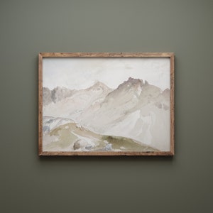 May include: A framed watercolor painting of a mountain range with a light gray and white color scheme. The mountains are depicted in a soft, abstract style, with a hint of green in the foreground.