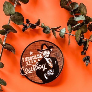 Avrei dovuto essere una decalcomania da cowboy