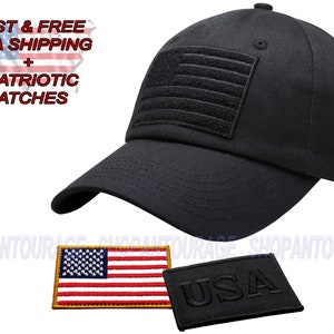 May include: Black baseball cap with an embroidered American flag patch on the front and a black "USA" patch on the side. The cap also comes with two additional patches: a small American flag patch and a black "USA" patch.