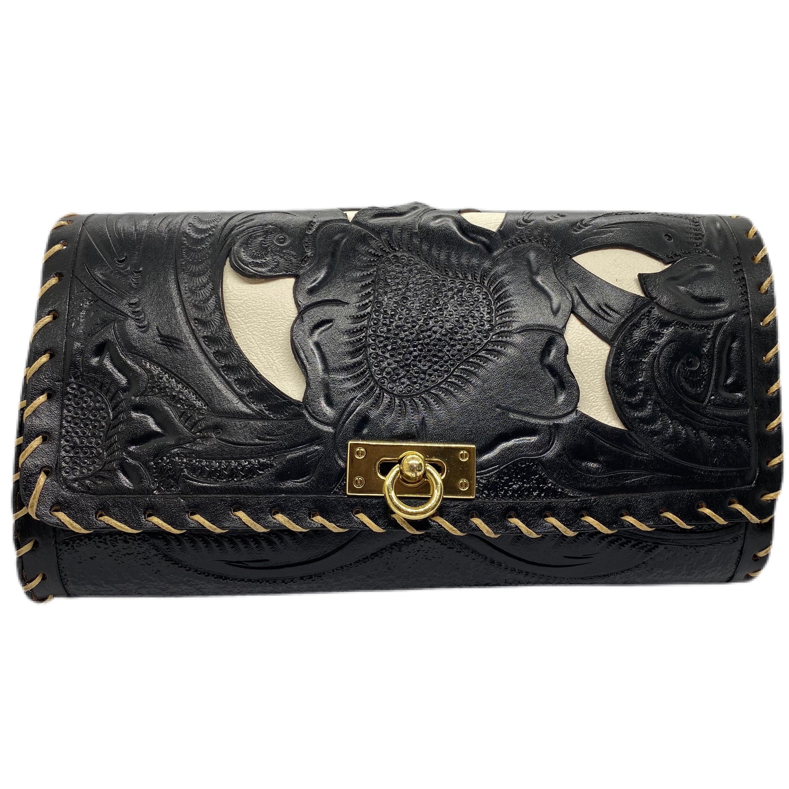 black tooled leather bag