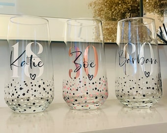 May include: Three personalized glasses with black and white polka dots. The glasses are decorated with the names Katie, Zoë, and Barbara, along with their ages 18, 30, and 20.