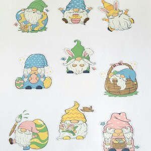 May include: Set of nine colorful gnome stickers with Easter themes. The gnomes are wearing hats and holding Easter eggs, baskets, and flowers.