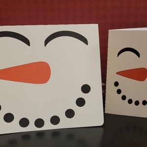 Bonhomme de neige au visage heureux, intérieur vierge, sourire, carotte, noir, blanc, noir, orange, carte idéale pour tous les âges, homme, femme, enfants, grand-mère, grand-père