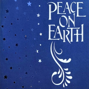 Carte pop-out Peace On Earth, Marie, Joseph, Enfant Jésus, étoiles, crèche, palmiers, bœufs, moutons, étoile du Nord
