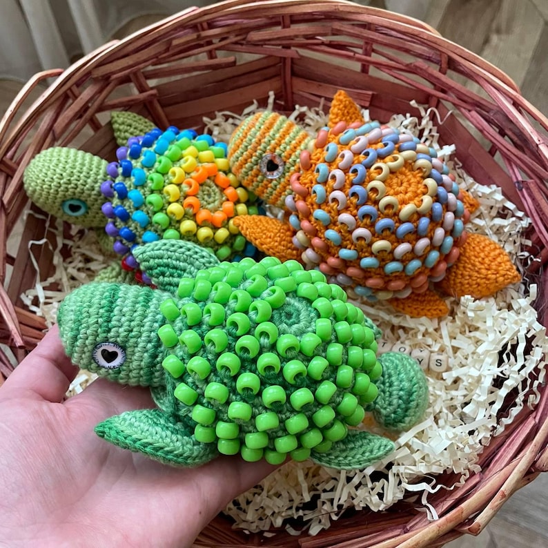 Pony beads on turtle shell for tactile sensory input