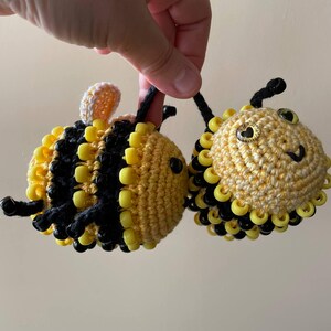 Side-by-side view of both bumblebee amigurumi styles