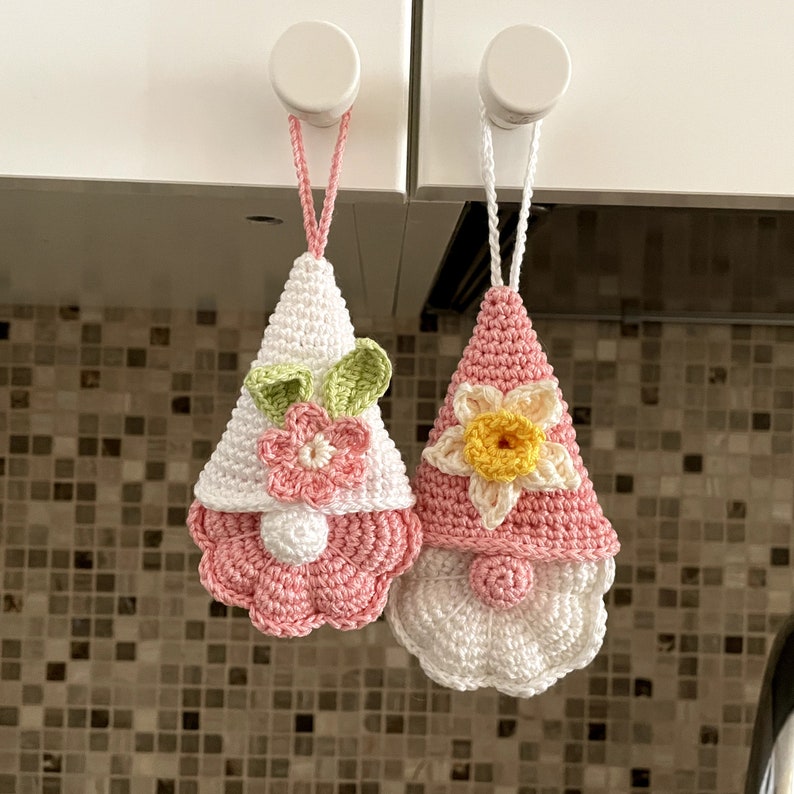Get ready for an adorable addition to your Easter decor with this Easter gnomes set of 12 crochet pattern! These charming gnomes, including flower gnomes, Easter bunny gnome, carrot gnome, and lamb gnome, will bring a whimsical touch to your home.