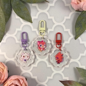 Llavero con diseño de flor de aldeano de AC - Llavero con diseño de videojuego - Llavero con diseño de animal - Charm kawaii