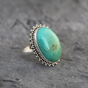Handmade Tibetan Turquoise Ring: Sterling Silver Oval Cabochon