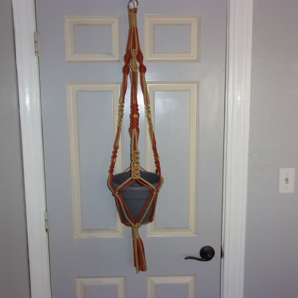 Short length macrame plant hanger, 36". Made with 6mm jute and rust colored polyolefin rope. Suitable for indoors or outdoors. FREE SHIPPING