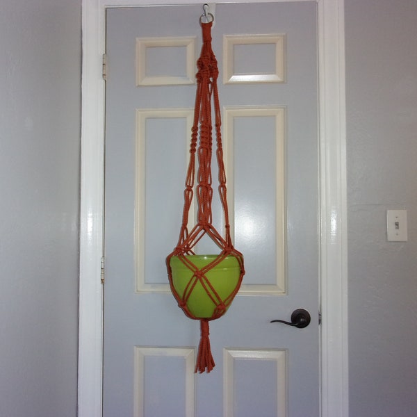 Medium length macrame plant hanger, 40".  Made with 6mm rust colored polyolefin rope.  Suitable for indoors or outdoors. Free shipping!!