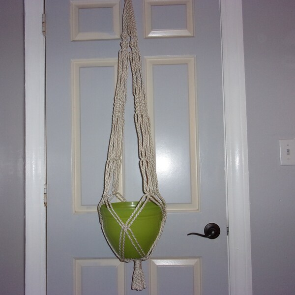 Medium length macrame plant hanger, 38". Made with 6mm oatmeal colored polyolefin rope. Suitable for indoors or outdoors.  Free shipping!!