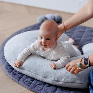 Cojin bebe boca abajo clearance