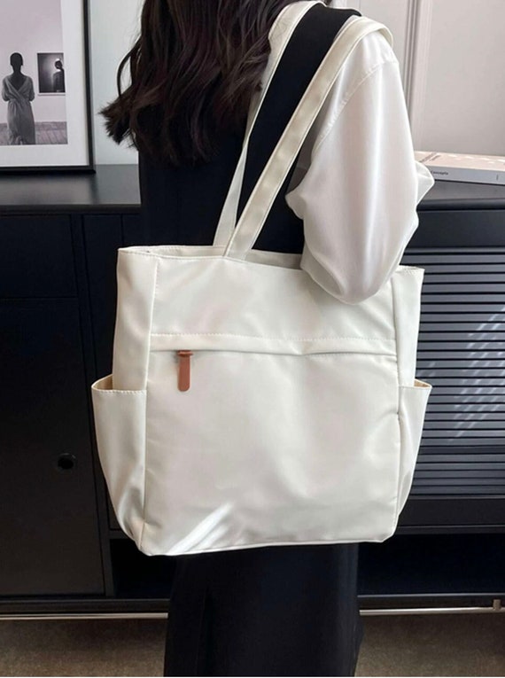 Creamy White Canvas Medium Shoulder Bag With Two Side Pockets