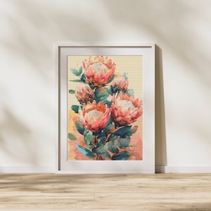 May include: A framed art print featuring a watercolor painting of protea flowers. The flowers are a mix of pink and orange, with green leaves. The artwork is displayed in a white frame, creating a clean and modern look.