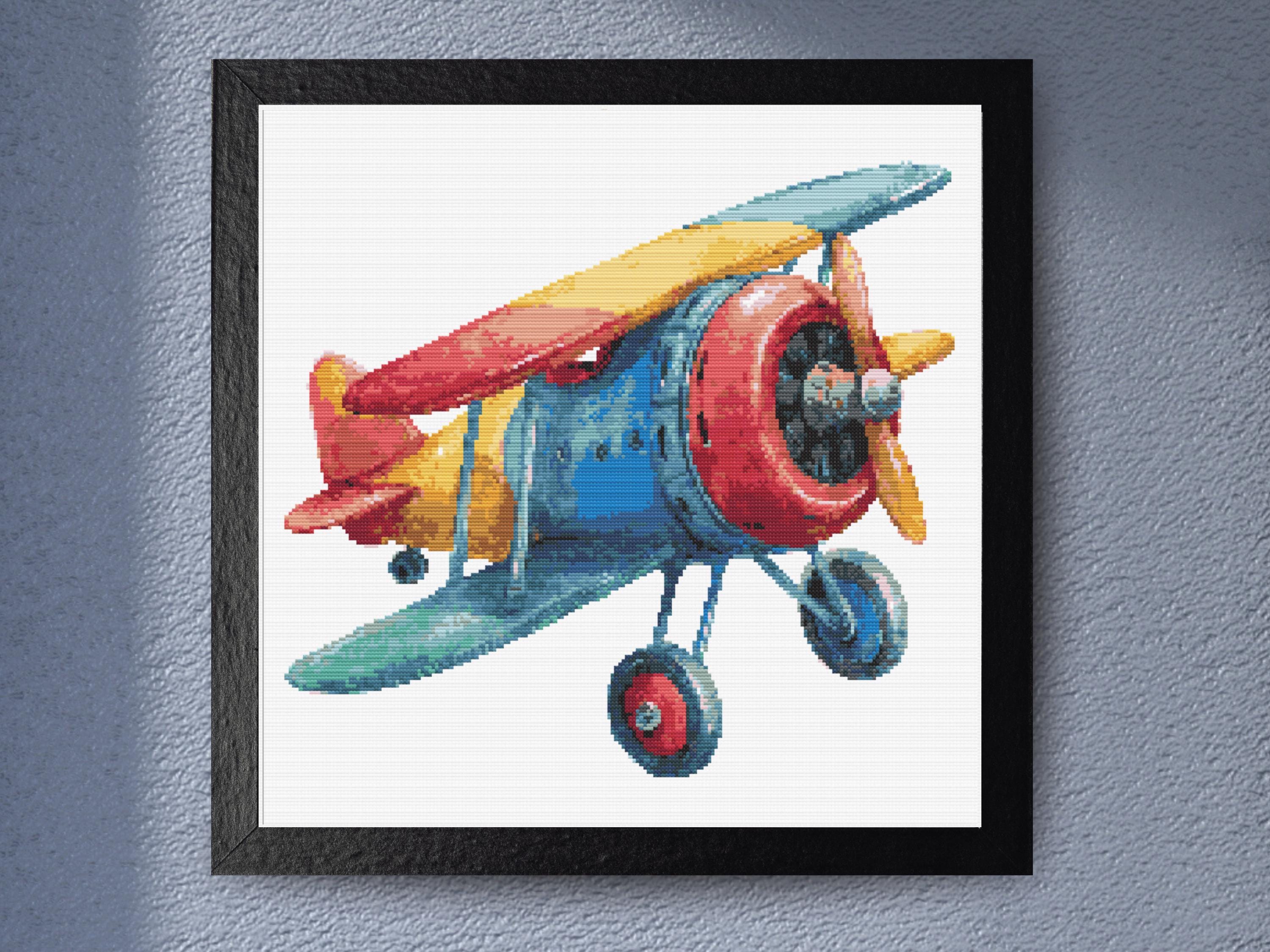 Vintage Biplane Cross Stitch Pattern with Bold Primary Colors and Realistic Detail Nursery Aviation Home Decor