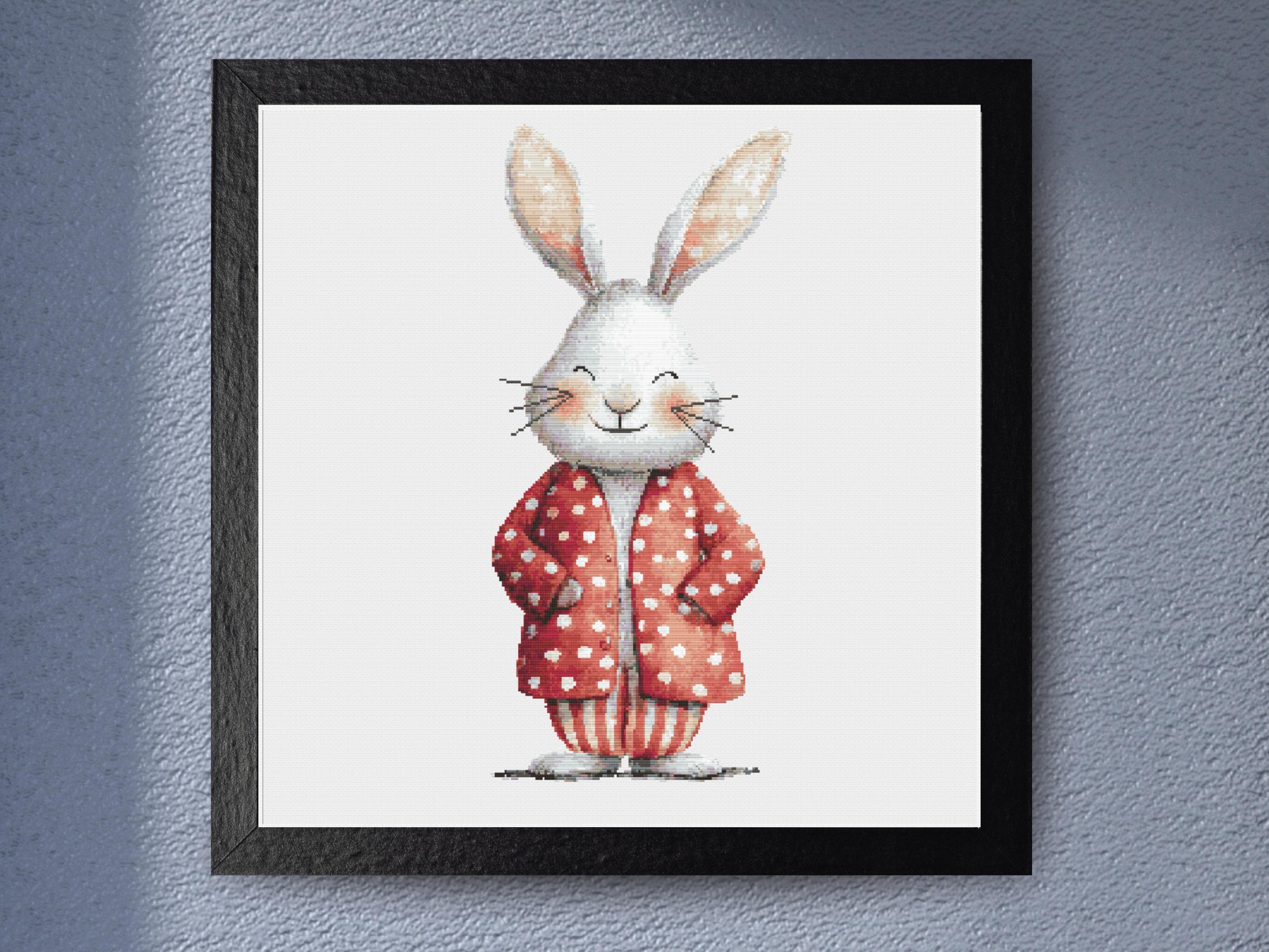 Smiling Bunny Cross Stitch Pattern in Red Polka Dot Coat and Striped Pajamas for Nursery or Whimsical Decor