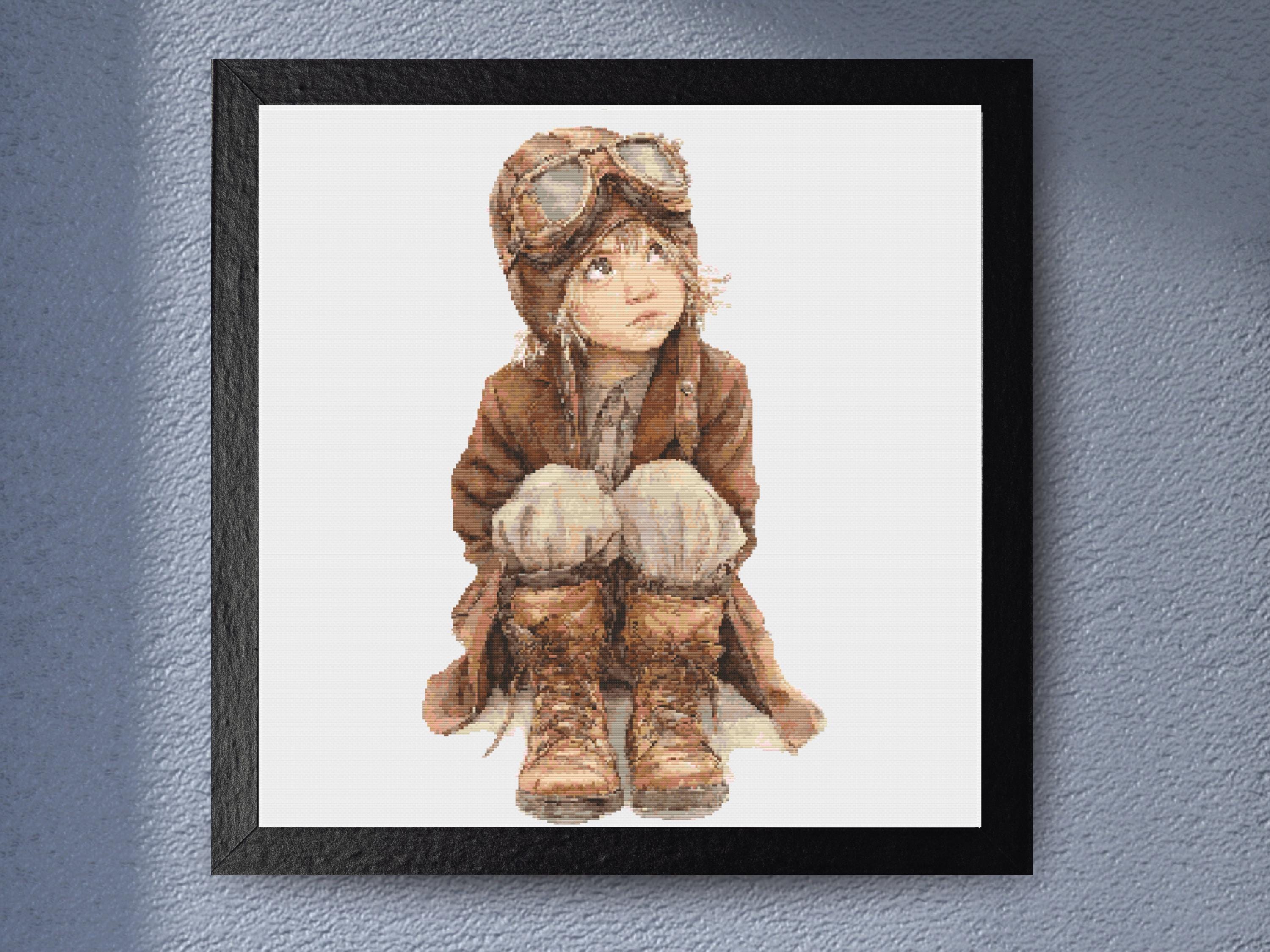 Vintage Aviator Child Cross Stitch Pattern with Earthy Tones and Nostalgic Charm for Embroidery Lovers