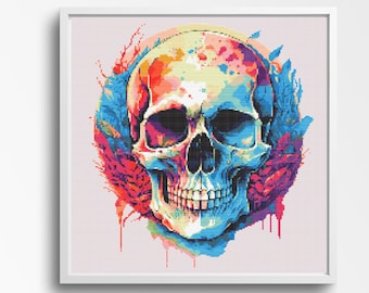 May include: A colorful skull art print in a white frame. The skull is rendered in vibrant hues of red, orange, yellow, blue, and purple. The artwork features a watercolor style with paint splatter effects and a circular design behind the skull.