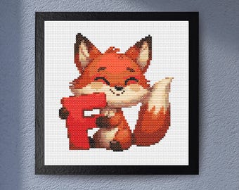 May include: Cross-stitch art of a smiling orange fox holding a red letter "F". The fox has a white belly and tail tip, with black accents. The artwork is framed in a black square frame, perfect for nursery decor.