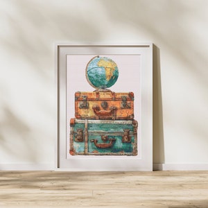 May include: A framed print featuring a stack of two vintage suitcases, one orange and one teal, topped with a globe. The globe has a blue and yellow color scheme, and the suitcases have metal hardware.