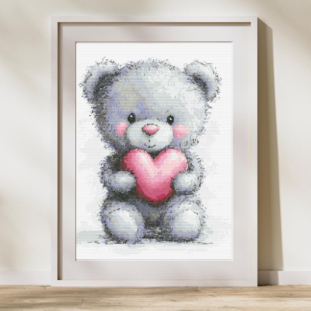 Adorable Teddy Bear Holding a Pink Heart - Image 1