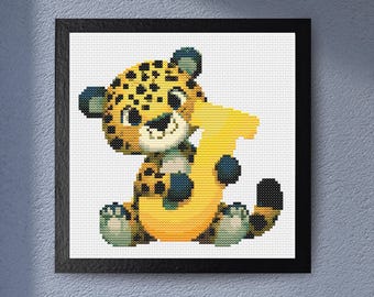 May include: Cross-stitch artwork of a smiling cartoon jaguar holding a yellow number 3. The jaguar has a yellow and black spotted coat, with blue accents. The artwork is framed in a black square frame.