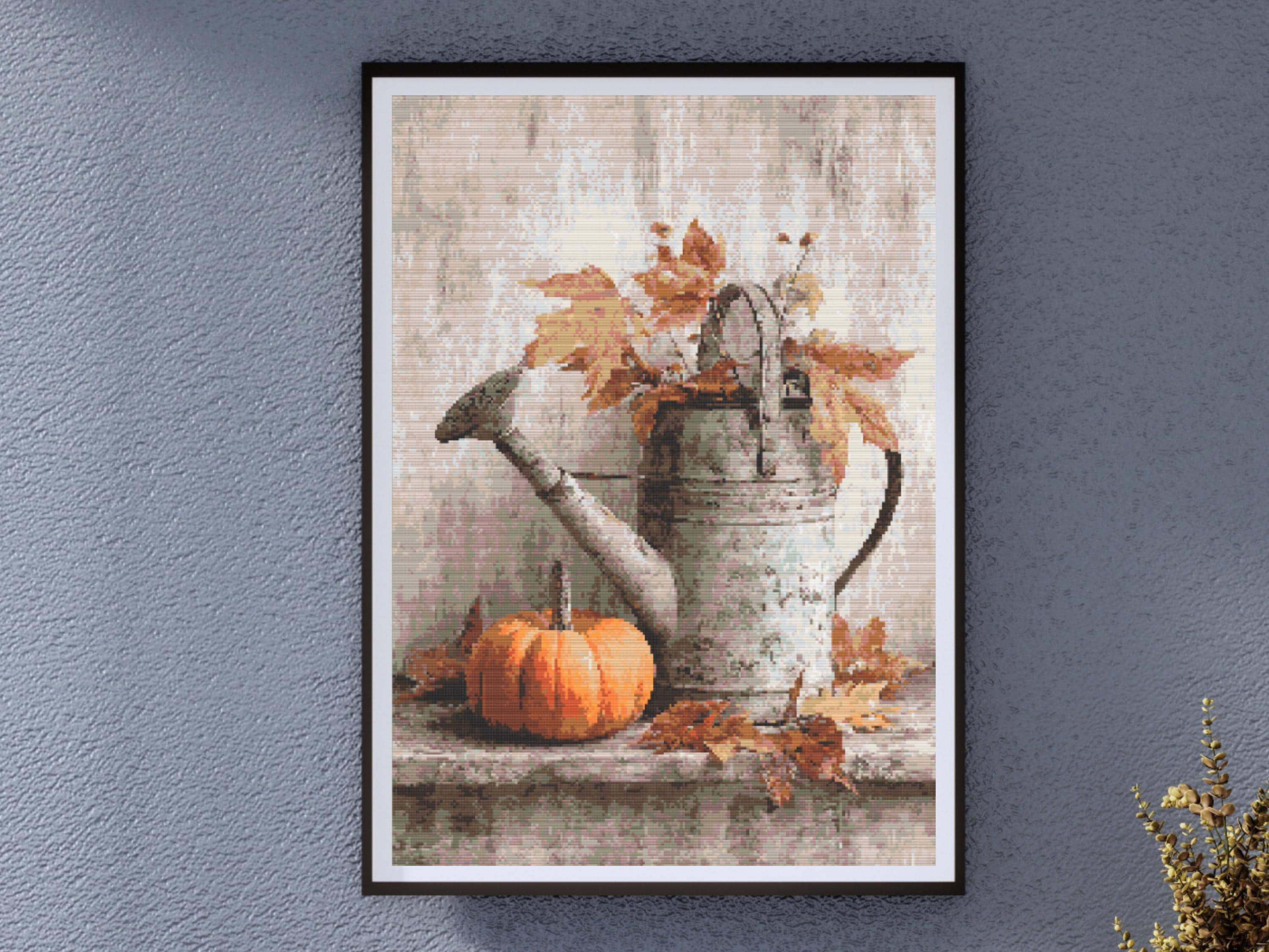 Rustic Watering Can with Pumpkin and Autumn Leaves - Image 1