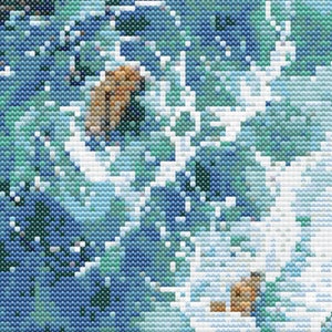 A close-up of a cross-stitch displaying a section of the pattern.