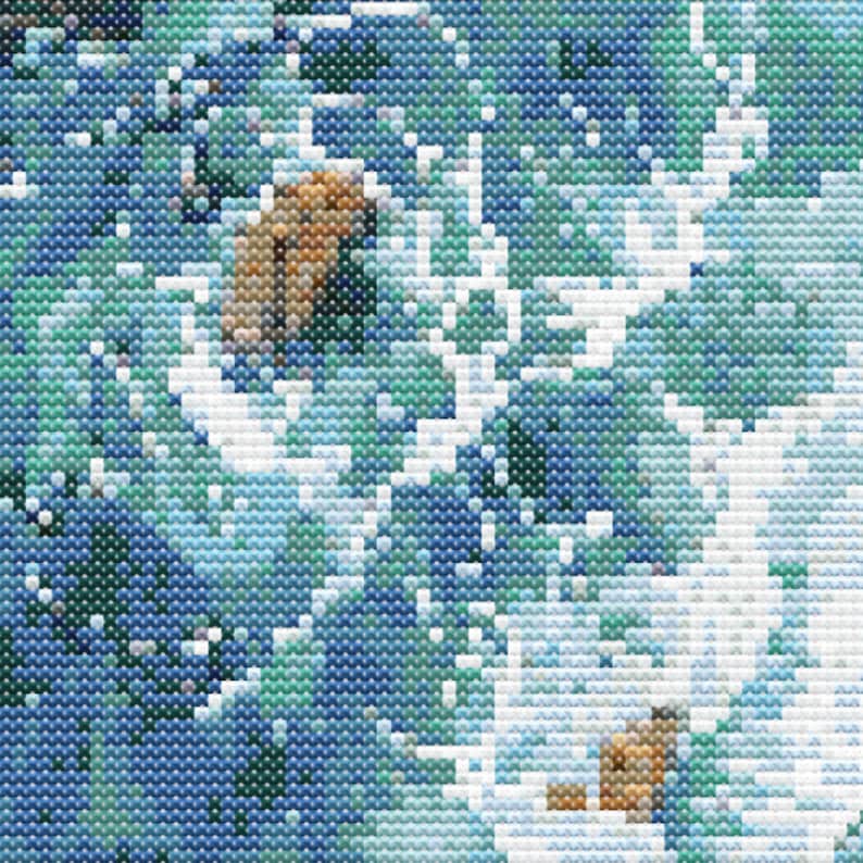A close-up of a cross-stitch displaying a section of the pattern.