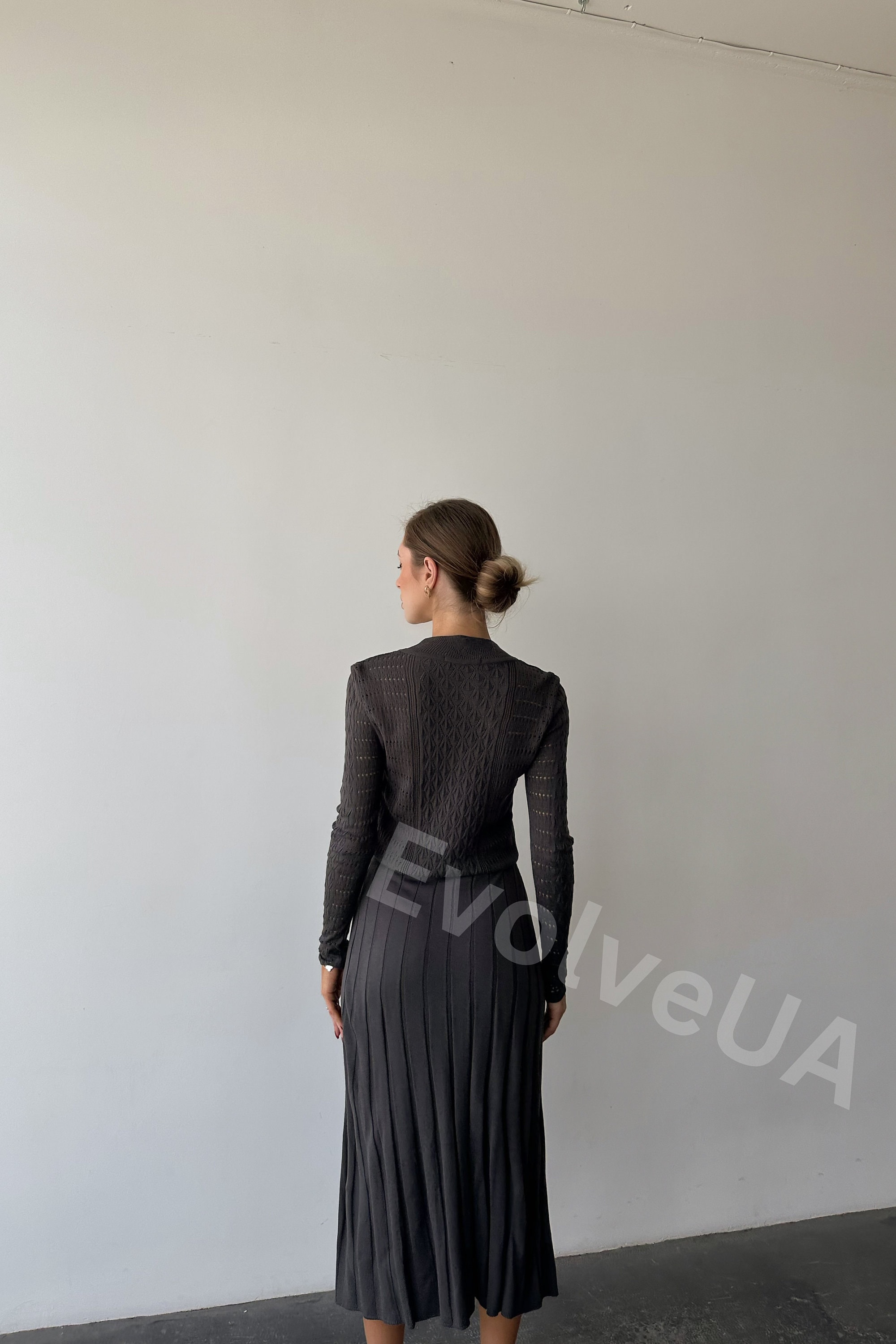 Blusa cngla, manca lunga e manca plssettata lunga, scollo rotondo