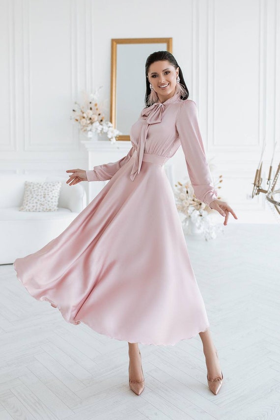 pink midi dress with sleeves