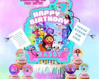 May include: A birthday cake topper set featuring Gabby's Dollhouse characters. The set includes a cake topper with the text "Happy Birthday Gabby", cupcake toppers, and numbers 1-12. The design is colorful with a light blue and pink color scheme.