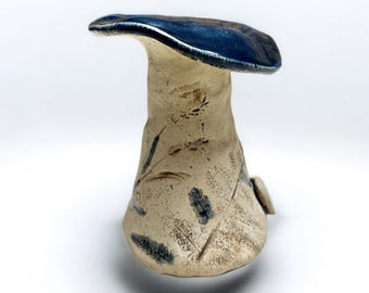 Autumn decoration mushroom, ceramic mushroom, autumn decoration for table and window sill. Garden decoration autumn time